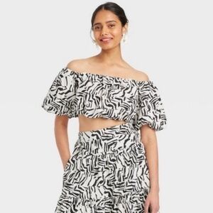 A New Day balloon off the shoulder top